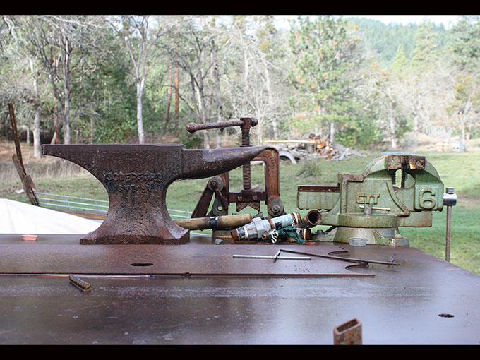 Jeremy Criswell's art studio welding table with pipe clamp, anvil and vice
